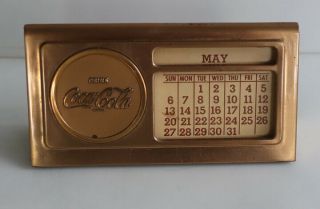 1950s Coca Cola Heavy Brass Calendar Sign With Button