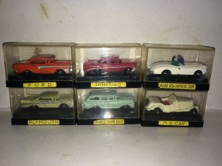 6 Vintage 50s A.  H.  I Japan Cars In Cases,  Plymouth,  Ford,  Chevrolet,  Pontiac,  Mg,  Jag
