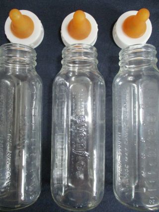 3 Vintage Evenflo Glass Baby Bottles with Rubber Feeding Teats 2