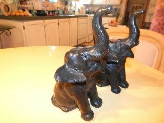 Two Antique Heavy Cast Iron Elephants