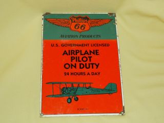 Antique Phillips 66 Airplane Pilot On Duty Embossed Metal Sign Avation