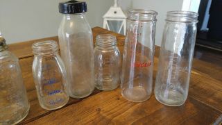 Set of (14) vintage glass bottles.  Each Baby bottle is different. 2