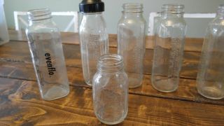 Set of (14) vintage glass bottles.  Each Baby bottle is different. 4