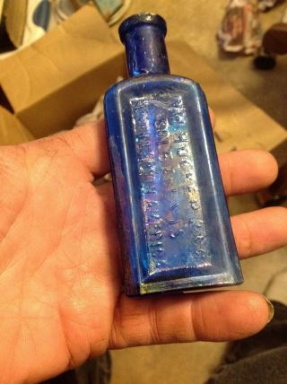 4.  75 " W H Hooker Cobalt Blue Throat & Lungs Medicine Bottle 1880 