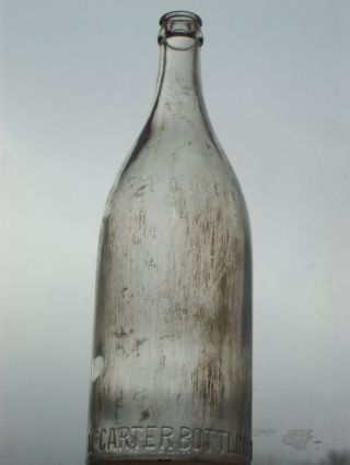 clear embossed glass 1 pint 14 FLD.  oz.  bottling Co.  Philadelphia,  Pa. 2