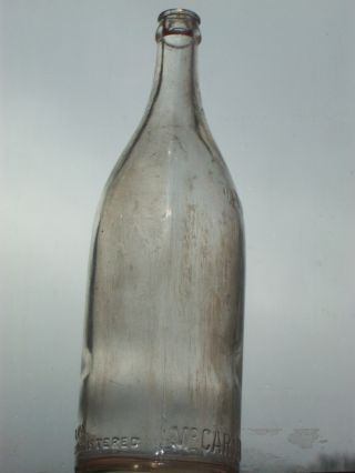 clear embossed glass 1 pint 14 FLD.  oz.  bottling Co.  Philadelphia,  Pa. 4