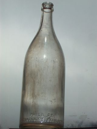 clear embossed glass 1 pint 14 FLD.  oz.  bottling Co.  Philadelphia,  Pa. 5