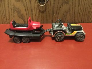Vintage Tonka Black Jeep Cj Wrangler With Matching Trailer And Red Snowmobile.