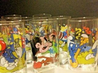 Smurf Glasses Set Of 8.  Pictures Dipict Charactures Of Smurfs And Gargamel Set