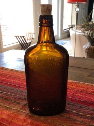 Vintage 9 1/4 " Brown Liquor Bottle Embossed Fox & 2 Stags Hudsons Bay Co