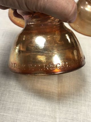 3 Vintage Pyrex Carnival Glass / Marigold Colored Insulators 63.  Shape 5