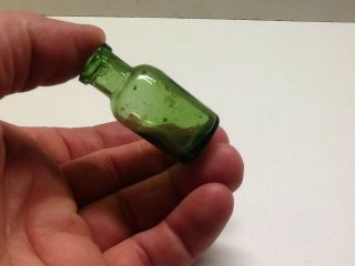 Tiny Antique 3 Piece Mold Green Cork Top Medicine Bottle.