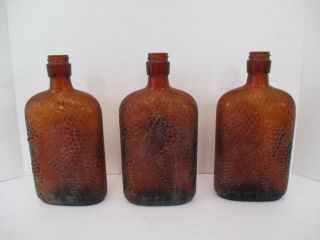 Set Of 3 Vintage Brown Wine Oval Bottles,  Elaborate Grapevine Decoration