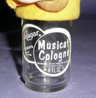 vintage top cat playing guitar bottle topper advertising delagar musical cologne 4