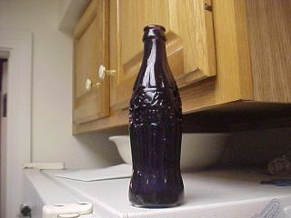 Coke Coca Cola Xmas Hobbleskirt Bottle - Deep Purple Color - Greenville,  N.  C.