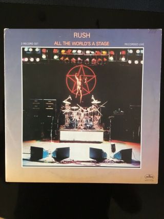 Rush All The World’s A Stage.  2 Lp Vinyl In Vg,
