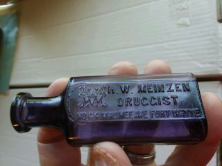 Purple H.  W.  Meinzen Druggist Fort Wayne,  Indiana Blown Pharmacy Bottle