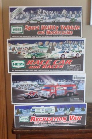 Hess Truck Set Of Four.  1998,  2004,  2005,  2009