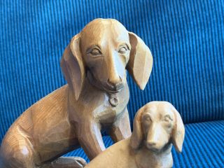 Hand - Carved Wooden Figurines of Dachshund Dogs.  Mother and pup? CUTE 2