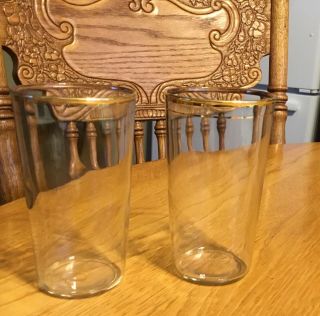 2 Vintage 8oz.  Drinking Glasses With Gold Trim At The Top.
