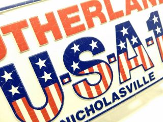 Vintage USA - 1 SUTHERLAND Chevrolet Dealership License Plate; Nicholasville KY 7