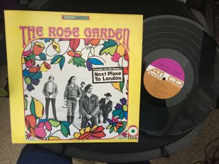 The Rose Garden With The Next To Plane Sticker On Cover