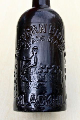 Vintage C1920s North Eastern Breweries Drayman Pictorial Black Glass Beer Bottle