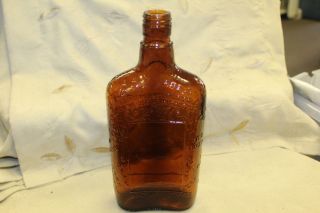 Vintage One Pint Amber Brown Whiskey Bottle With Words Imprinted In Glass Empty