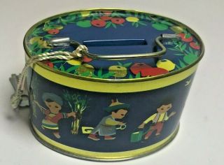 Vintage Oval Shaped Tin Can Bank with Children on Navy Blue Can with Key (A051) 3
