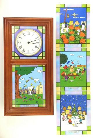 The Peanuts Stained Glass Light Up Clock With Seasonal Panels The Danbury
