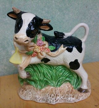 Ceramic Black & White Cow Figurine Statue Jumping On Green Grass W/ Flowers
