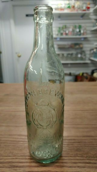 Antique Brandon Brewing Co.  Brandon Man.  Embossed Clear Beer Bottle