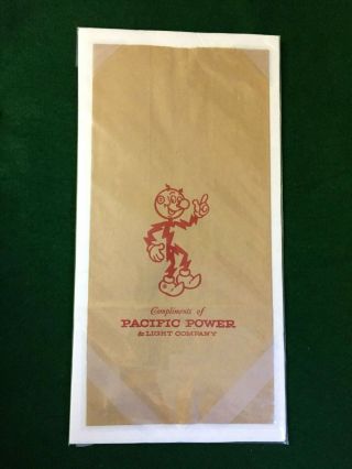 Vintage Reddy Kilowatt Pacific Power Paper Bag Advertising Premium