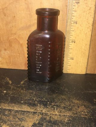 Old Antique Poison Bottle Embossed Amber Color