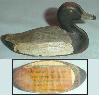 Antique Advertising Cast Iron Duck Figure Bacharach - Rasin Your Favorite Gun Shop