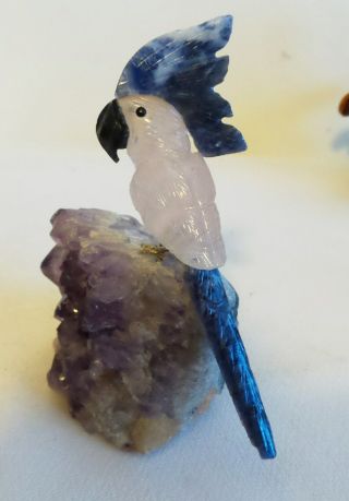 Carved Pink Quartz Parrot With Lapis Cone And Tail Setting On Amethyst Stone