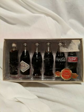 Coca - Cola The Evolution Of The Coke - Cola Contour Bottle 1899,  1900,  1915,  1915,
