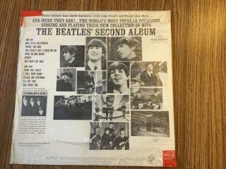 “The Beatles Second Album” U.  S.  1964 LP in Sears baggie near - 2