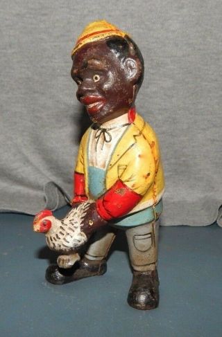 Black Man Holding A Chicken Cast Iron Dime Bank Ethnic Americana Suggestive