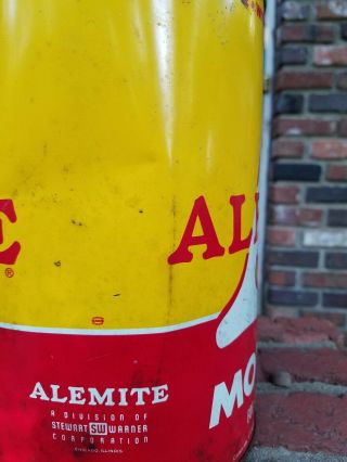 Old Alemite Big A 5 quart Oil Can,  full and,  bold red and yellow can 5