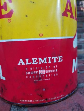 Old Alemite Big A 5 quart Oil Can,  full and,  bold red and yellow can 7