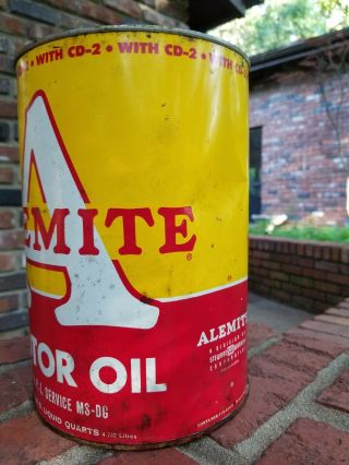 Old Alemite Big A 5 quart Oil Can,  full and,  bold red and yellow can 8