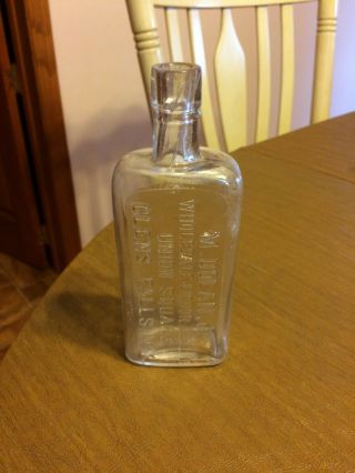 Whiskey Bottle,  M.  Dolan,  Jr.  Union Square Glens Falls,  N.  Y.