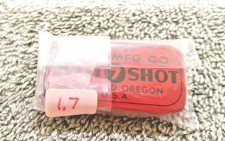 Vintage Split Shot MFG.  By Olson MFG.  CO,  size 7 Portland Oregon orange in color. 4