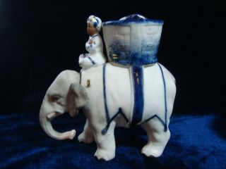 An Antique Porcelain Nodding 