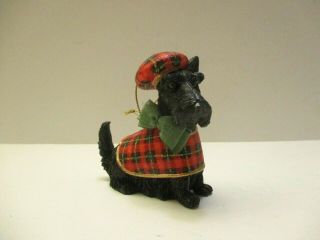 Black Scotty Dog Sitting With Tartan Hat And Tartan Jacket Ornament