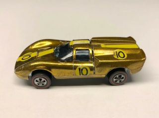 Hot Wheels Redline 1968 Lola Gt70 Metallic Yellow Gold With Black Interior