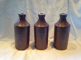 Three Antique Stoneware Beer Bottles