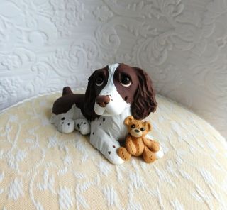 English Springer Spaniel with Teddy Bear Clay Sculpture by Raquel at theWRC 3