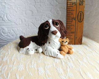 English Springer Spaniel with Teddy Bear Clay Sculpture by Raquel at theWRC 8